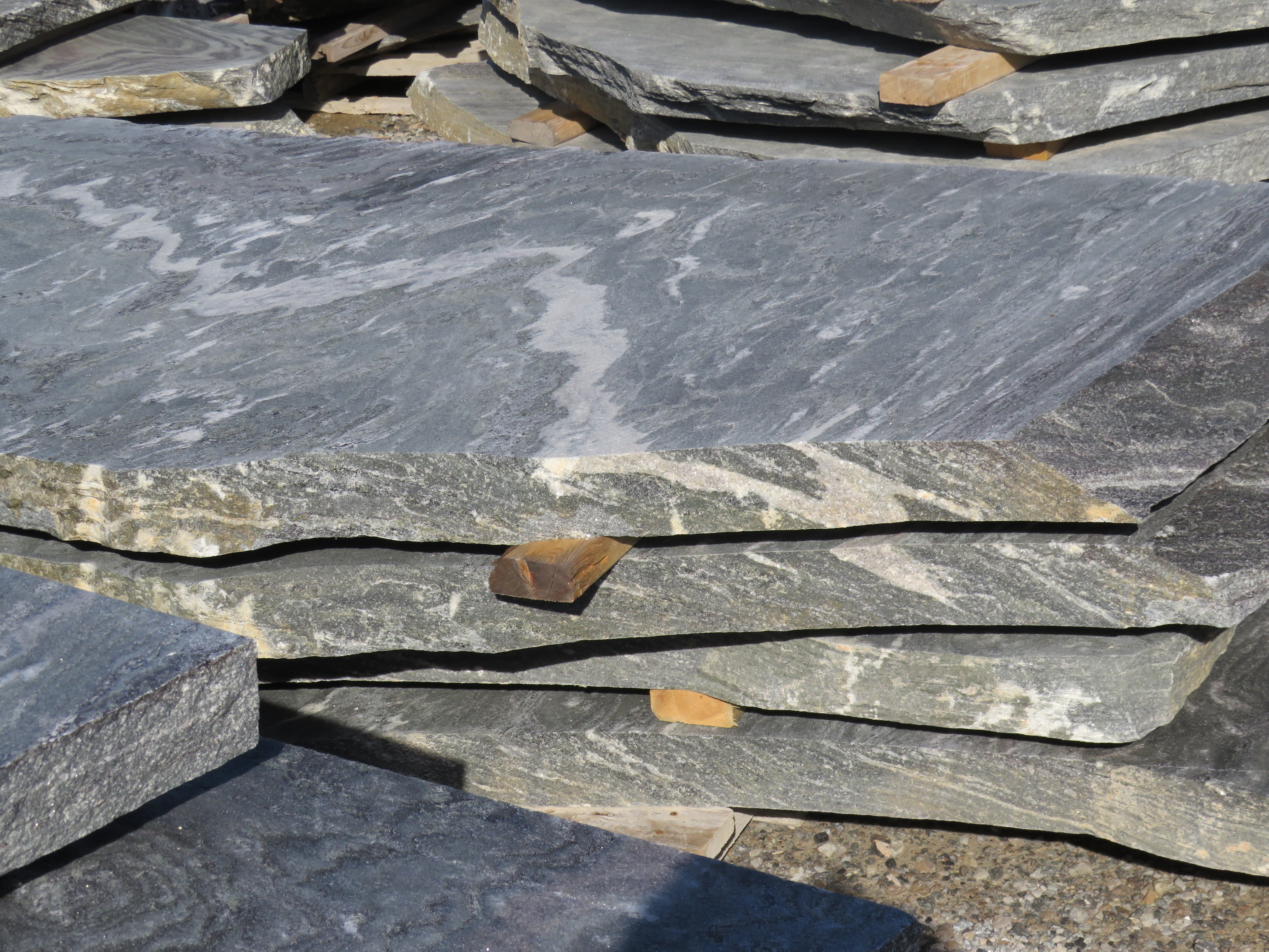 Elite Blue granite irregular flagstone with sawn textured face — Published by Elroy Wagler on August 17, 2020 August 17, 2020