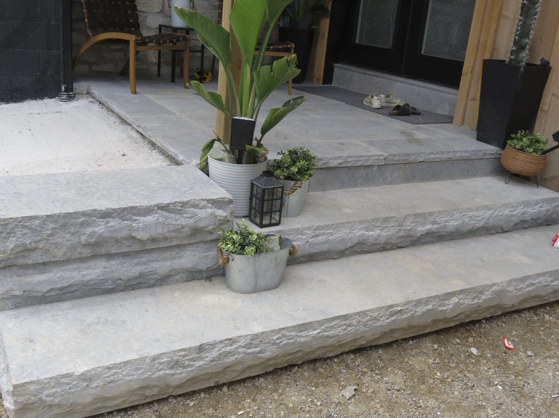 Weatheredge Limestone natural stone steps with 7-inch rock-face edge on patio transition