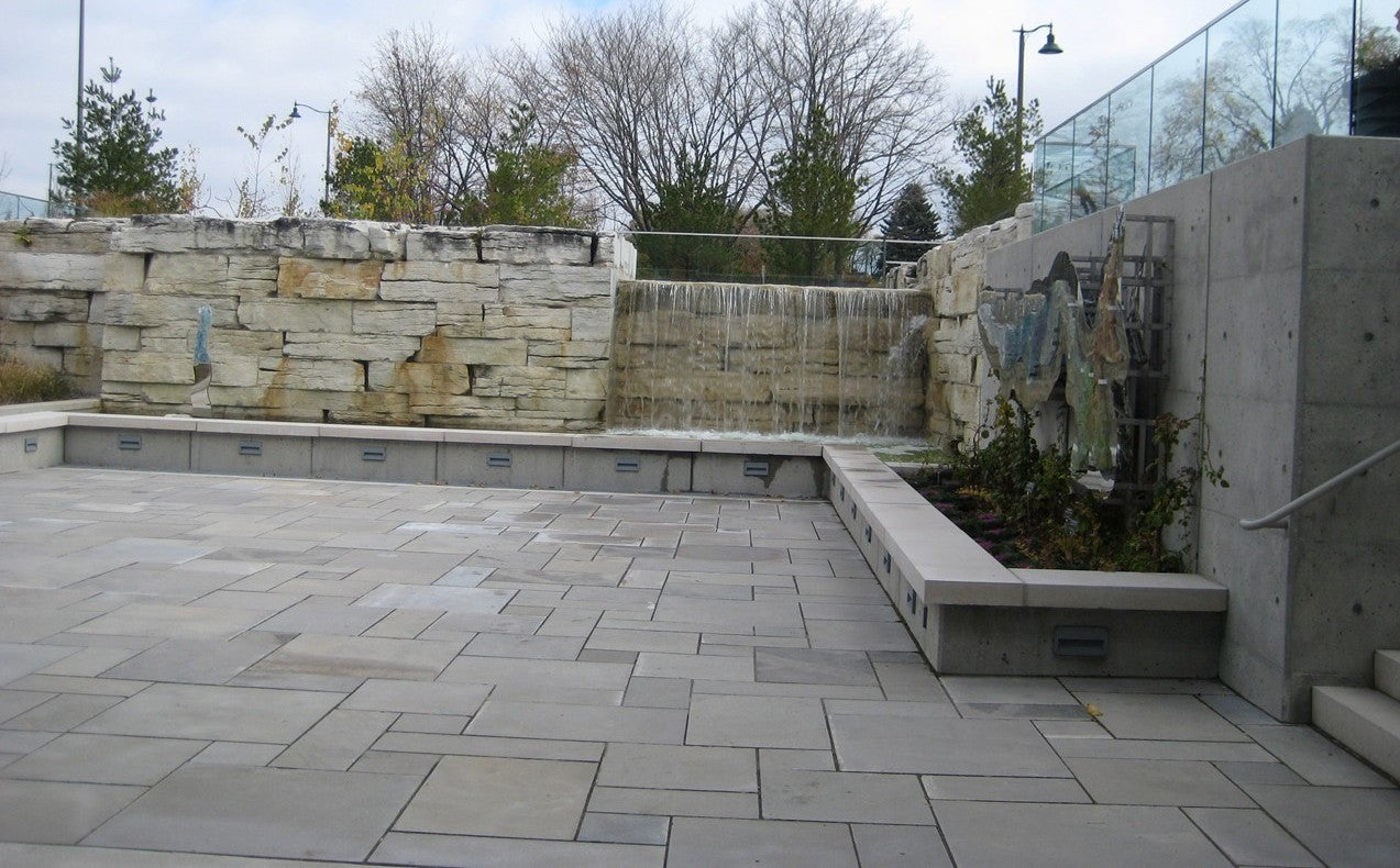 Tumbled limestone garden path flagstone — stacked pallet detail