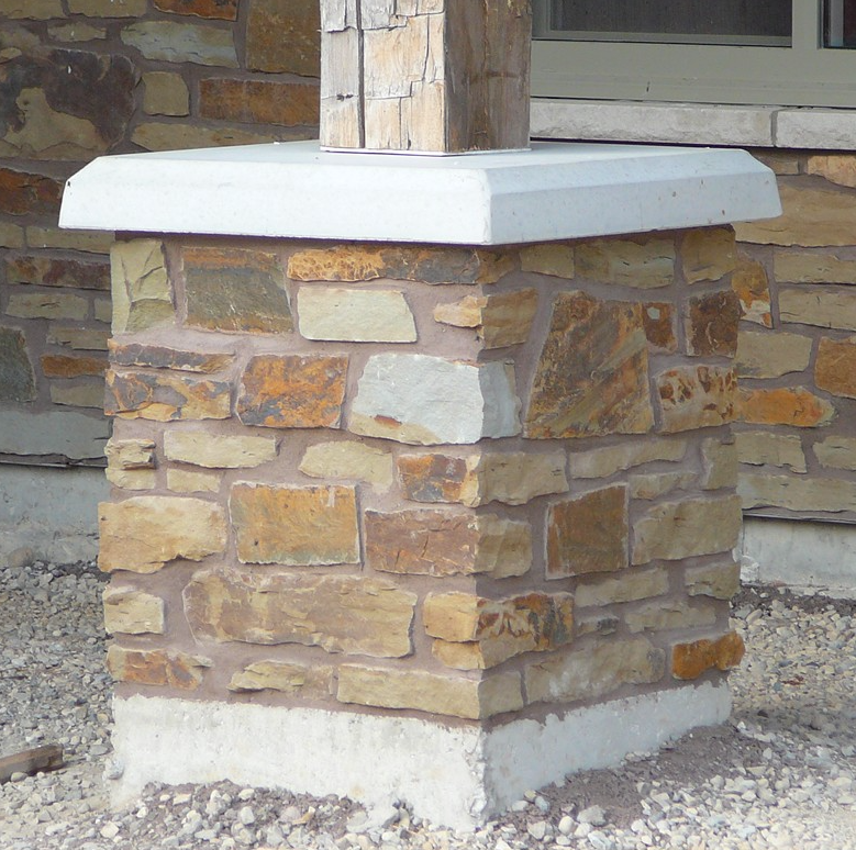Peterbourough Fence Wall with Eden Mills Rustic Ranch - Earth Tone Blend Thin Stone Veneer - Flats